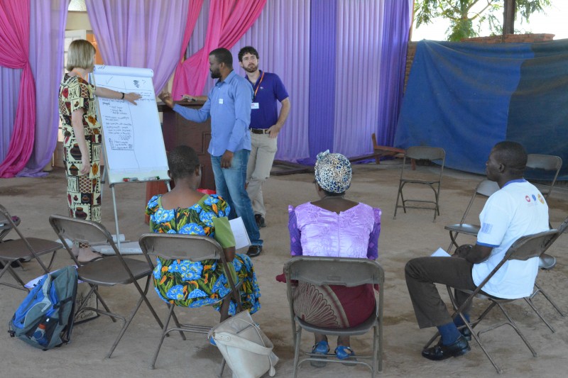 Caroline helping to train a local committee of volunteers running a Links microenterprise development scheme in central Malawi.