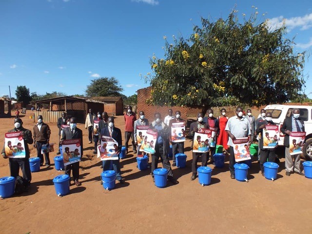 Community leaders collecting food and life-saving health information during the COVID-19 crisis.